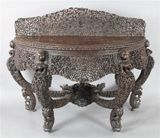A 19th century Burmese carved hardwood console table, W.5ft 2in. D.2ft 2in. H.3ft 6in.
